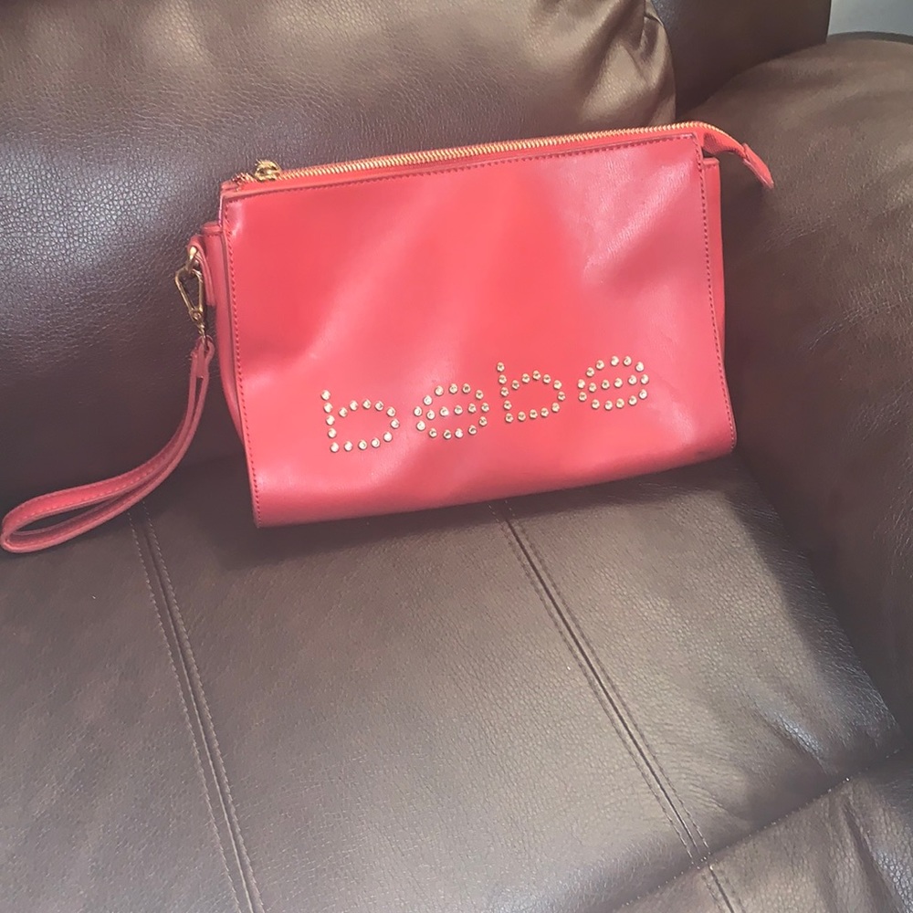 Bebe red wrist bag